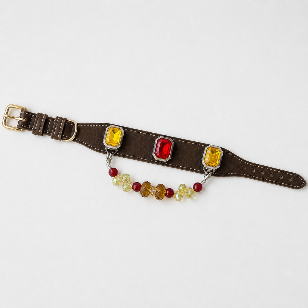 Full-length brown dog collar with red and yellow charms and bead strand laid flat