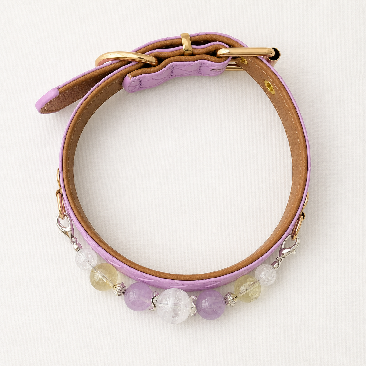 Overhead view of lavender basketweave collar with brown lining and crystal bead strand